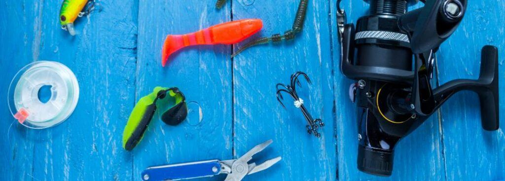 fishing gear pliers and reel